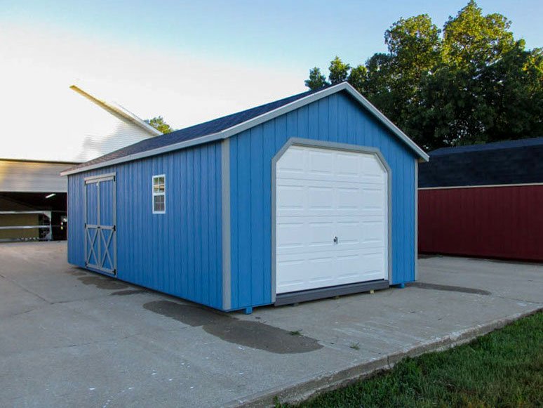 A-frame garage with a wide overhead door and contrasting trim
