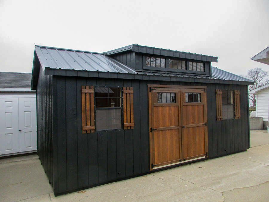 Cape Cod Shed with a symmetrical, residential-inspired front